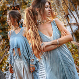 A timeless and comfortable bohemian dress crafted with love, featuring a hand-loomed layover and handmade embroidery.