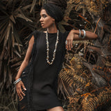 Ladders and open sides make this black mini dress a boho-chic must-have.