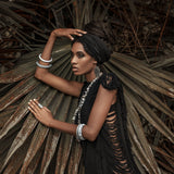 Give your wardrobe a bohemian edge with this ladder-detailed mini dress.