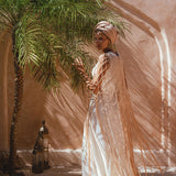 Stand Out in Aya Sacred Wear’s Powder Pink Summer Net Cover Up 