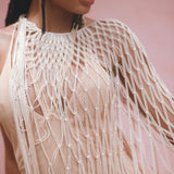 Add a touch of elegance to your summer wardrobe with the Powder Pink Summer Cover Up from Aya Sacred Wear. 