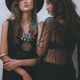 Get summer-ready with the black Summer Net Cover Up by Aya Sacred Wear.