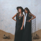 Look effortlessly stylish in the black Summer Net Cover Up from Aya Sacred Wear.