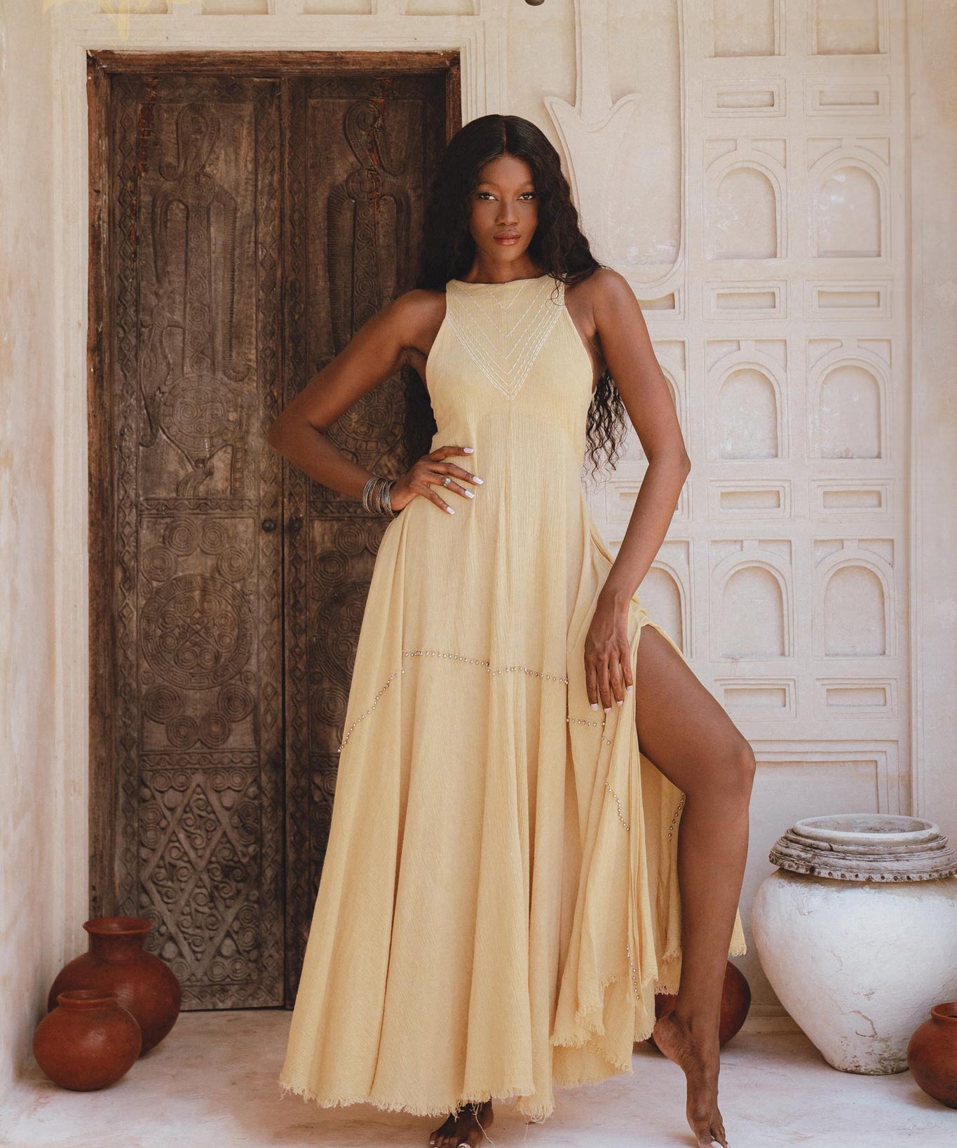 Organic Bohemian Cocktail Dress with small jingle bells; inspired by Indian women's culture. Embroidered by artisans for a unique, minimalist style.