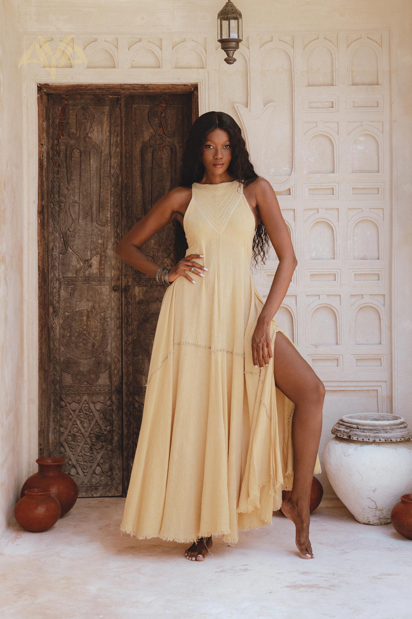 Organic Bohemian Cocktail Dress with small jingle bells; inspired by Indian women's culture. Embroidered by artisans for a unique, minimalist style.