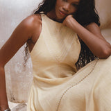 Minimalist Gold Goddess Dress with Boho jingle bells; a reflection of Indian culture in hand-embroidery. Organic cotton with a special ombré effect.