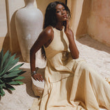 Gold Goddess Dress inspired by Indian woman culture; small jingle bells create soft sound, hand-embroidery, and unique ombré effect using organic dyes