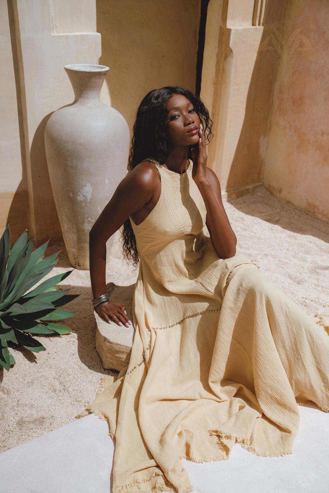 Gold Goddess Dress inspired by Indian woman culture; small jingle bells create soft sound, hand-embroidery, and unique ombré effect using organic dyes