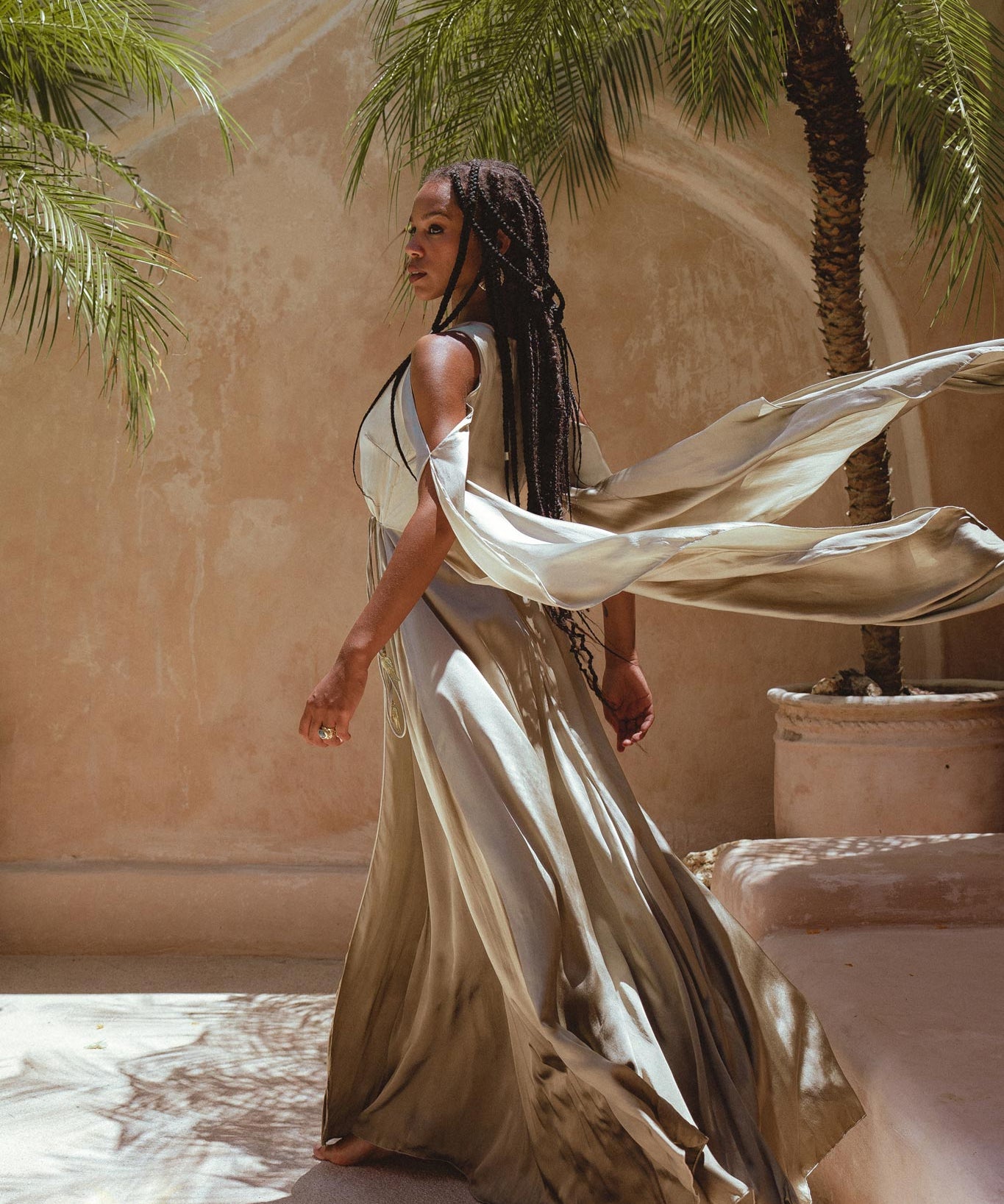 Find the perfect outfit for your special day with Aya Sacred Wear's Gradation Sage Wedding Dress. 