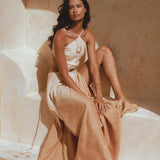 Elegant powder pink to beige maxi dress, tailored for comfort and style. Made from organic linen, featuring open sides and a unique ombre effect.