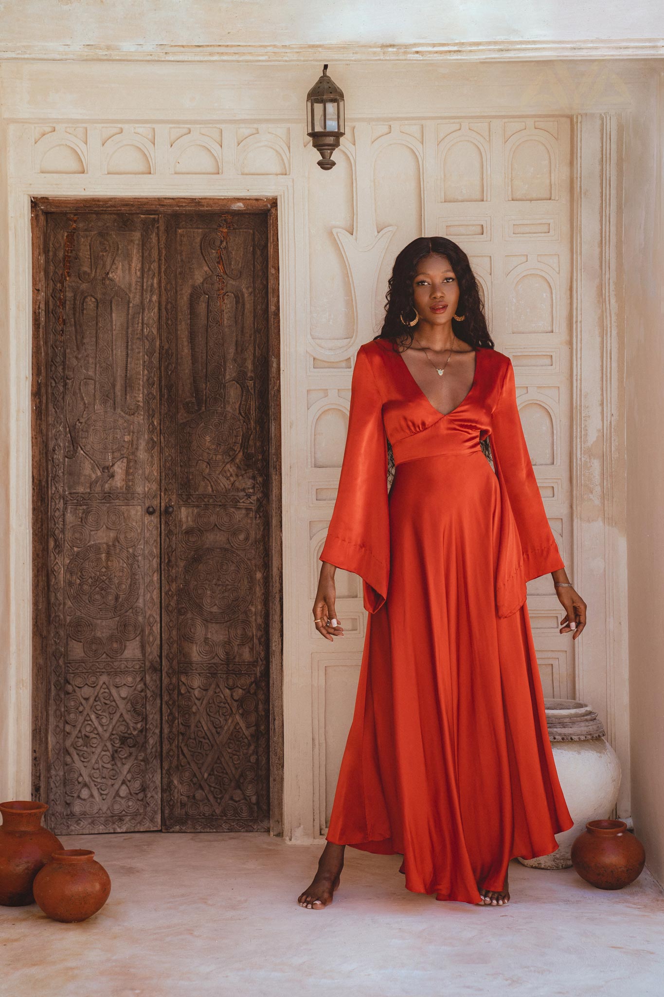 Elegant Beach Wedding Dress - Ivory and Red Peace Silk Gown with Open Back, from the Shanti Grace Collection.