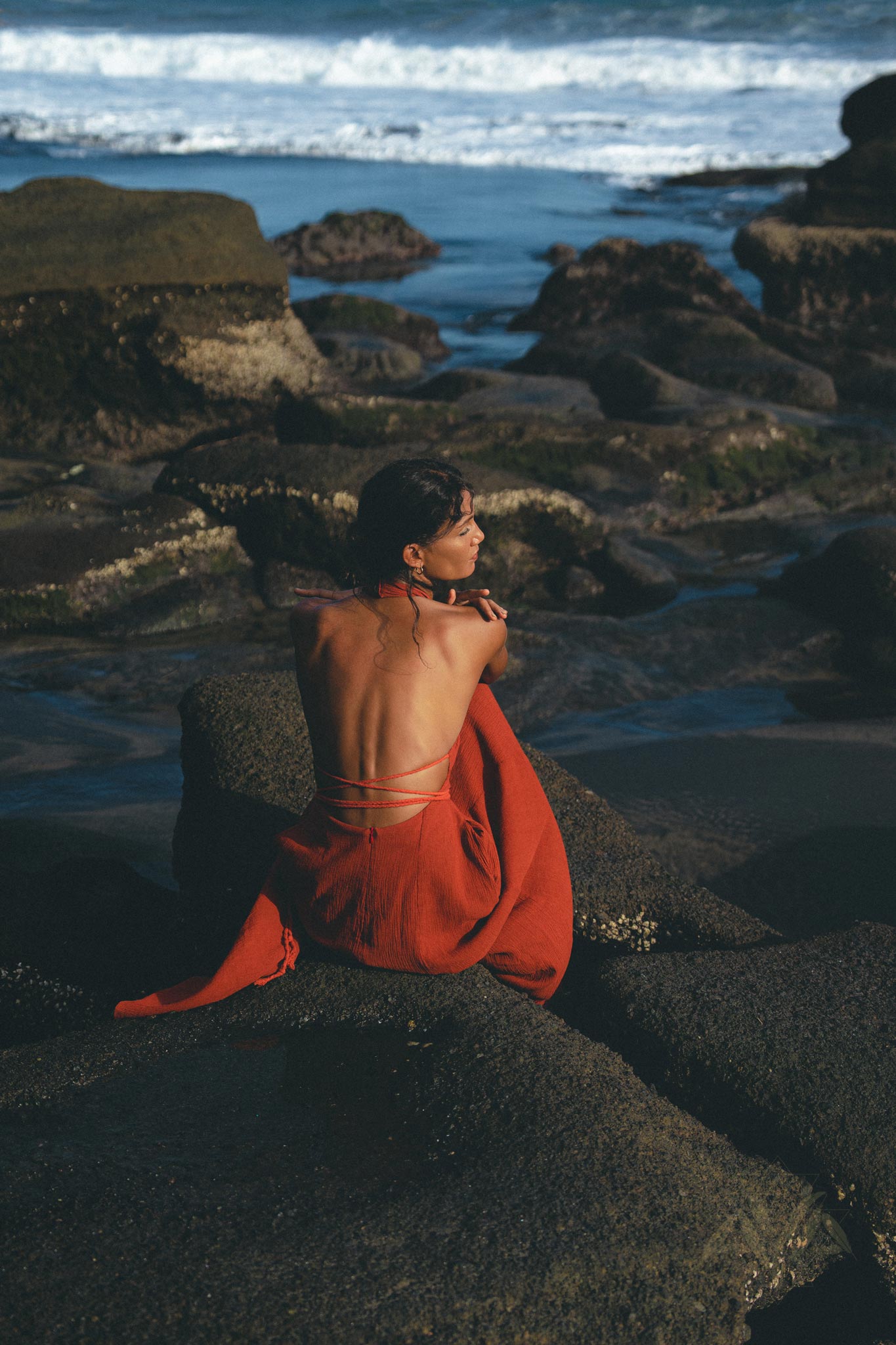 What looks perfect for a beach guest? A red wine goddess dress complete with an adjustable open back & belly. 
